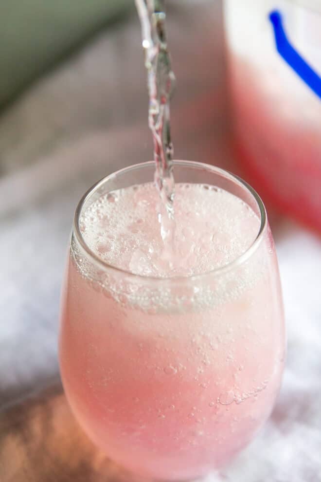 Pink Lemonade Vodka Slush by Culinary Hill - Nothing screams summer more than frosty fruity drinks. Wine slushies, mules, sangria,  mimosas, cocktails, margaritas, and more! Graduations, Memorial Day, Fourth of July, or just a summer gathering with friends and family are all great reasons to throw a summer party.  No summer party is complete without fruity, slushy, cold drinks. You'll love these 10 summer drink recipes.  You'll be happy you tried them all. #summerdrinks #summerdrinkrecipes #foodanddrink #frozendrinks #wineslushies #frozencocktails #cocktails #partydrinks #partydrinkrecipes #HWS #healthywealthyskinny