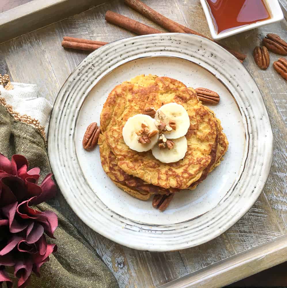 Paleo Pumpkin Spice Pancakes | Starting your day with the perfect breakfast just makes your entire day run smoother. These grain-free, pumpkin-packed, and super delicious Paleo Pumpkin Spice Pancakes definitely do the trick. #paleo #pumpkin #pumpkinspice #pumpkinpancakes #pancakes #HWS #healthywealthyskinny