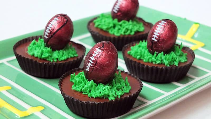 Game Day Peanut Butter Cups by Tablespoon | Super Bowl Party Food Ideas for your next super bowl party. Get Super Bowl recipes for appetizers, main dishes, chicken wings, drinks and cocktails. Find party food recipes to make your football party a crowd favorite. #superbowl #partyfood #partyrecipes #foodanddrink #superbowlparty #HWS #healthywealthyskinny
