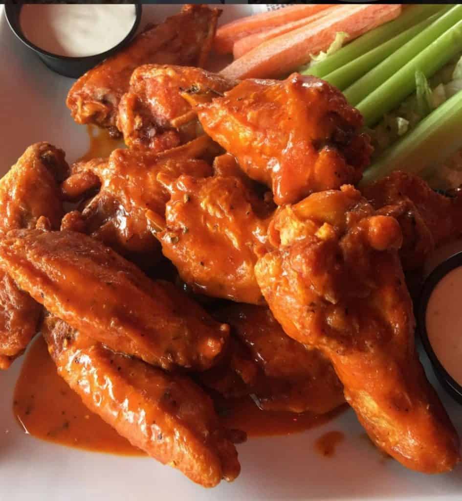Buffalo Chicken Wings by Mama Maggie's Kitchen | Super Bowl Party Food Ideas for your next super bowl party. Get Super Bowl recipes for appetizers, main dishes, chicken wings, drinks and cocktails. Find party food recipes to make your football party a crowd favorite. #superbowl #partyfood #partyrecipes #foodanddrink #superbowlparty #HWS #healthywealthyskinny