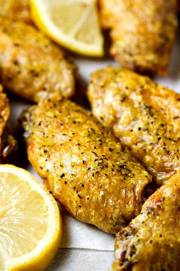 Crispy Baked Lemon Pepper Wings by The Wicked Noodle | Super Bowl Party Food Ideas for your next super bowl party.  Get Super Bowl recipes for appetizers, main dishes,  chicken wings, drinks and cocktails. Find party food recipes to make your football party a crowd favorite. #superbowl #partyfood #partyrecipes #foodanddrink #superbowlparty #HWS #healthywealthyskinny
