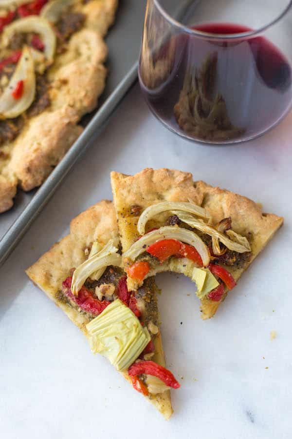 Gluten Free Fennel Pesto Pizza by Fooduzzi | Super Bowl Party Food Ideas for your next super bowl party.  Get Super Bowl recipes for appetizers, main dishes,  chicken wings, drinks and cocktails. Find party food recipes to make your football party a crowd favorite. #superbowl #partyfood #partyrecipes #foodanddrink #superbowlparty #HWS #healthywealthyskinny